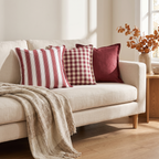 Laholm burgundy cushions on a linen sofa