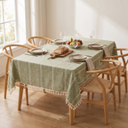 Marstrand sage green tablecloth on a dining table