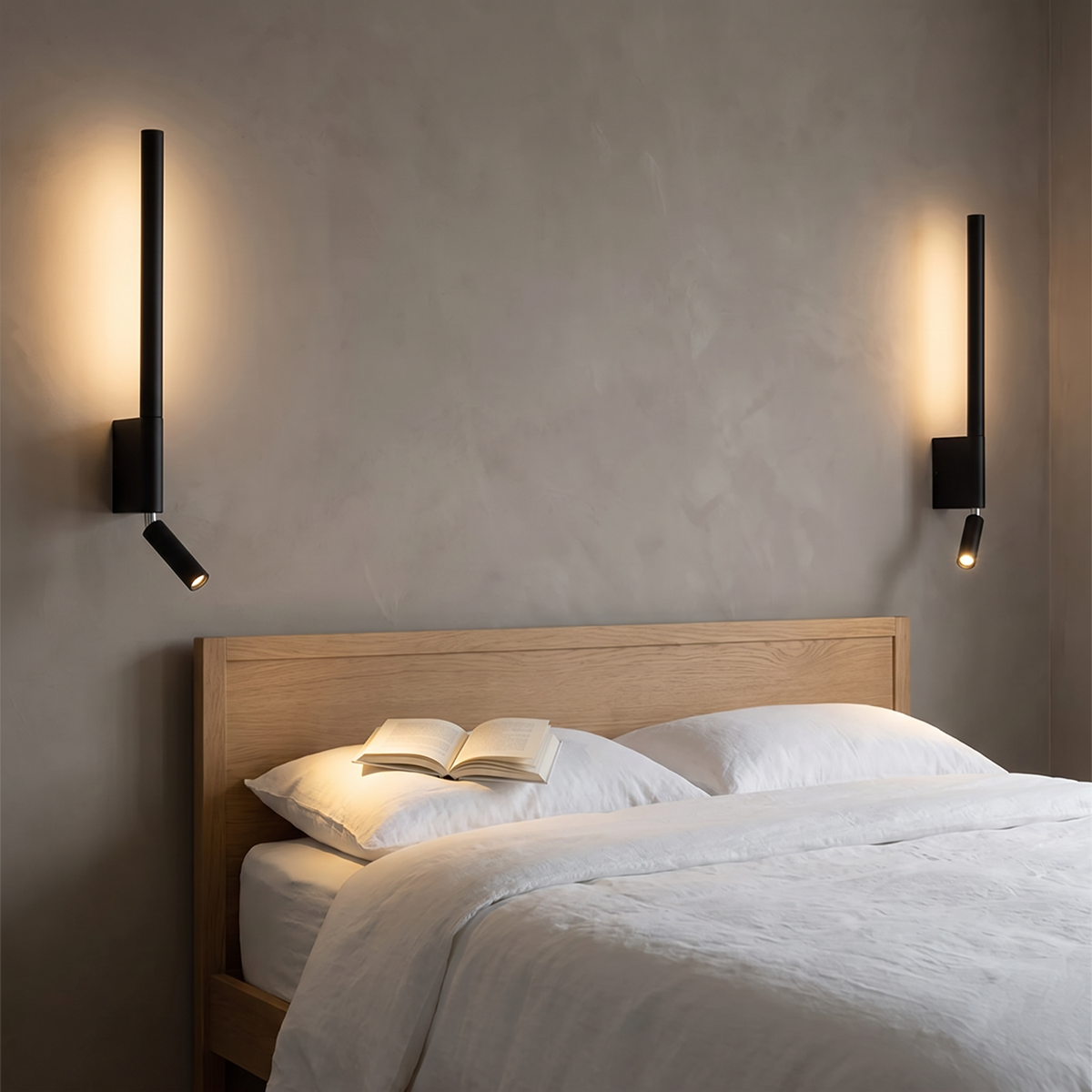 Aurich linear wall light lit on a wall