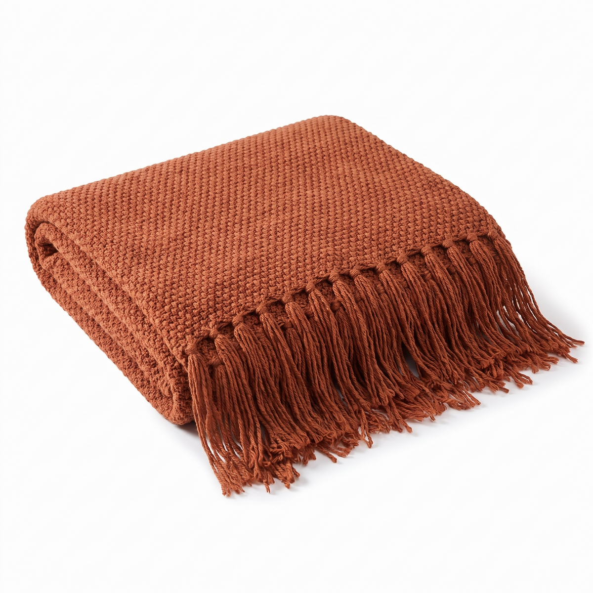 Uelzen knitted tassel throw in rust