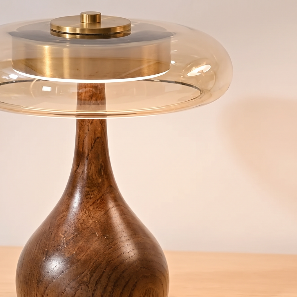 Close up of the glass disc and brass tone stem