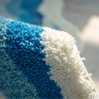 Close up of the tufted blue wave pile