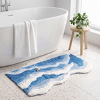 Lemvig wave bath mat beside a freestanding bath
