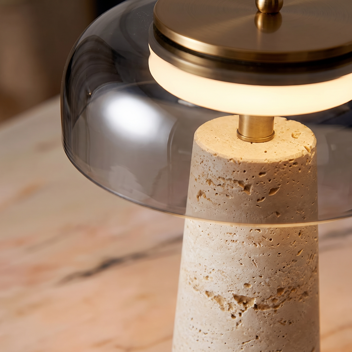 Close up of the travertine column and glass dome