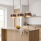 Three Svaneke pendants over a kitchen island