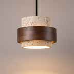 Svaneke stone and walnut tone pendant light, lit