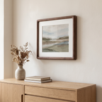 Ebeltoft large solid wood frame in walnut with white mount above an oak sideboard