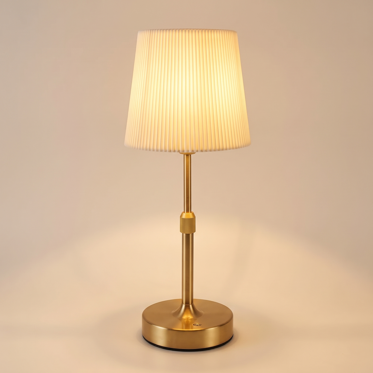 Tallberg cordless pleated table lamp in gold