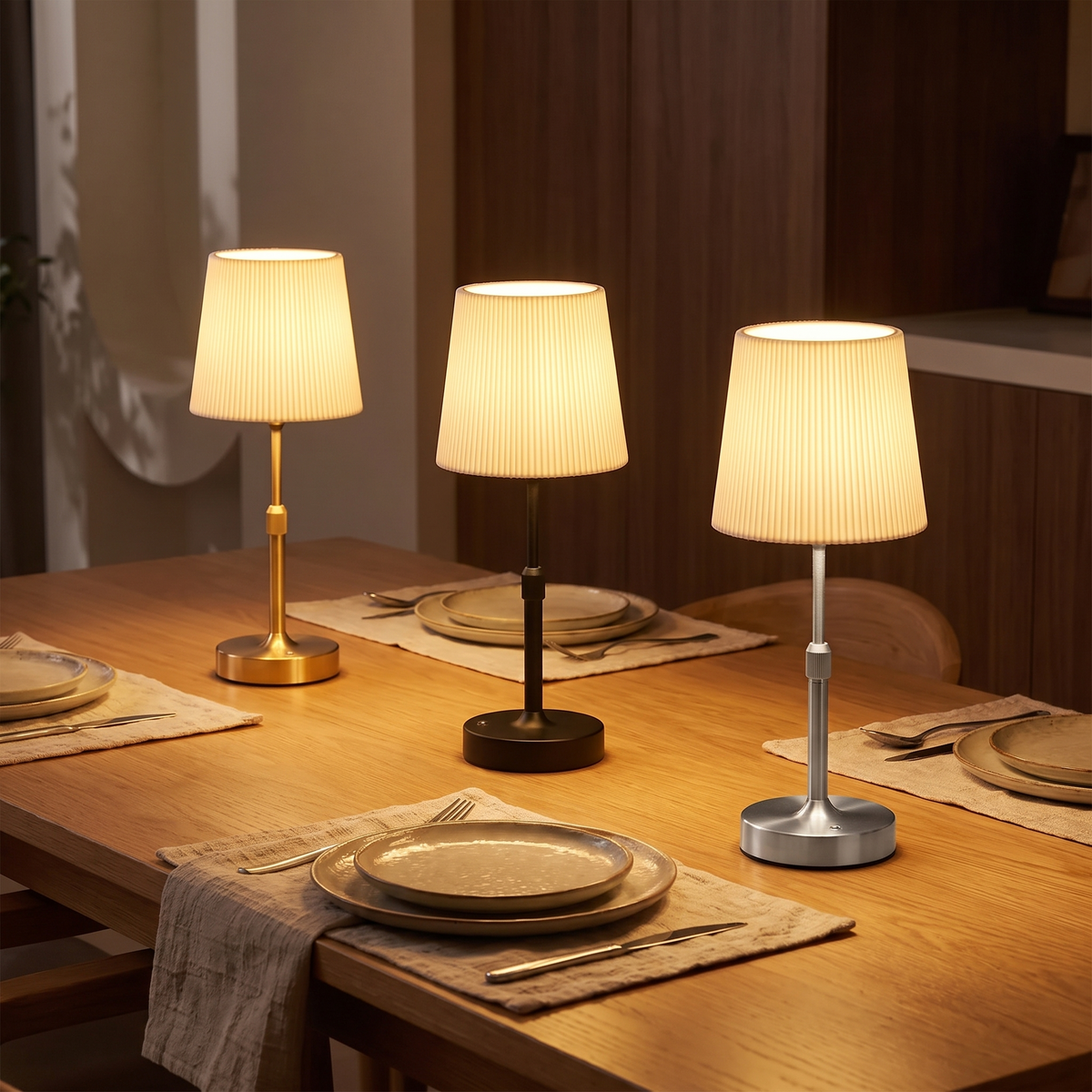 Tallberg lamps in gold, black and silver on a dining table