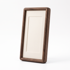 Gorlitz long solid wood photo frame in walnut tone with a cream mount