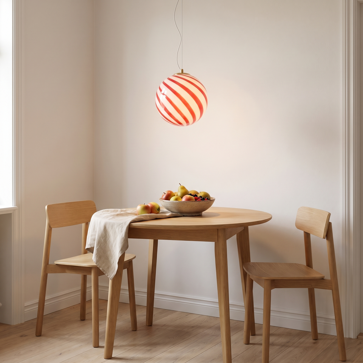 Soderhamn Striped Glass Globe Pendant in a room setting
