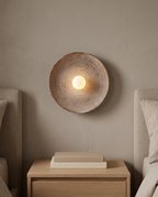 Meersburg Round Textured Wall Light in a room setting
