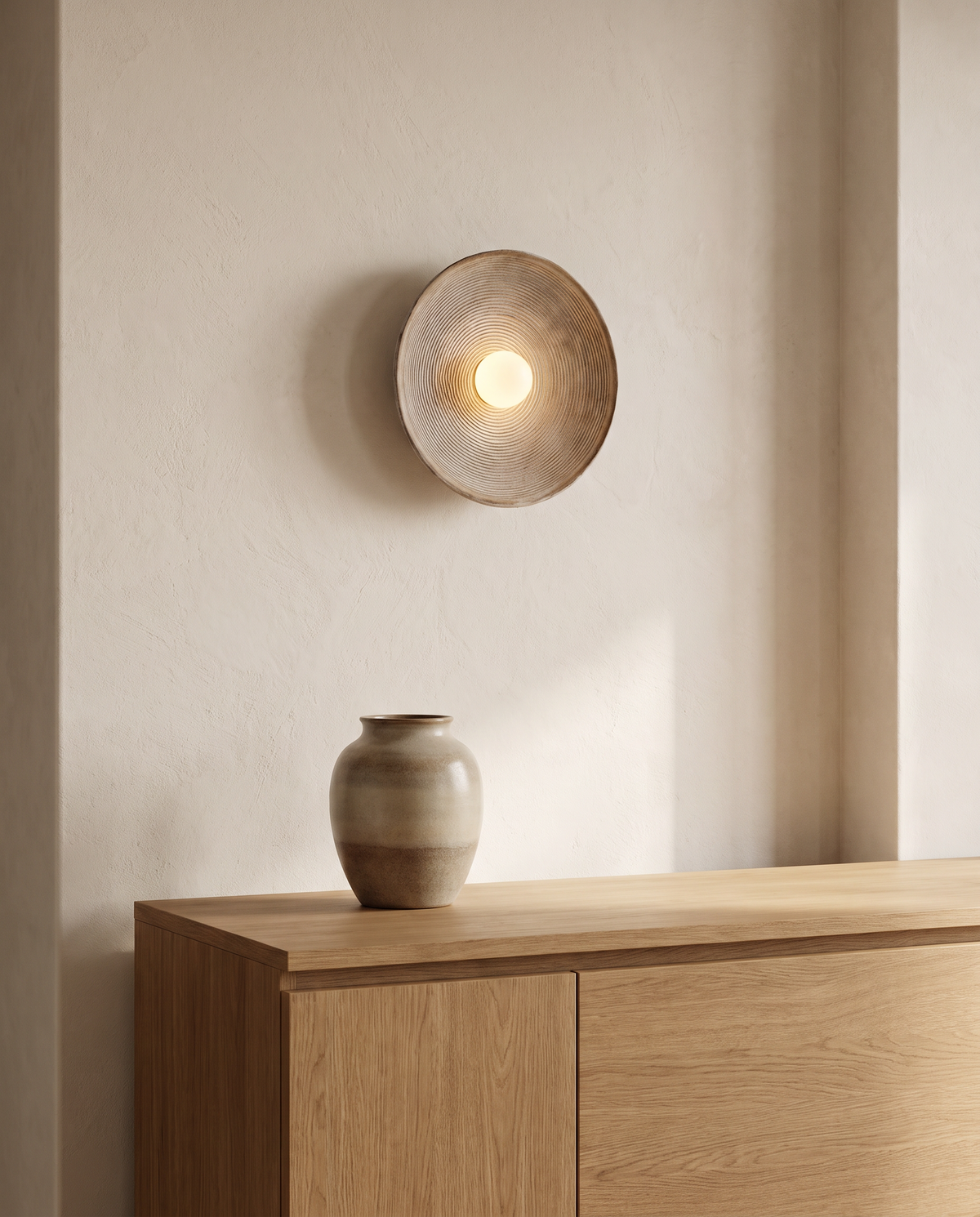 Meersburg Round Textured Wall Light in a room setting