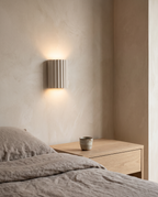 Trysil Fluted Up and Down Wall Light in a room setting