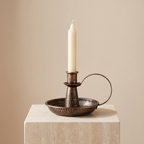 Hoganas chamberstick candle holder with taper candle, detail