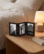 Hildesheim black folding photo frame on a bedside table