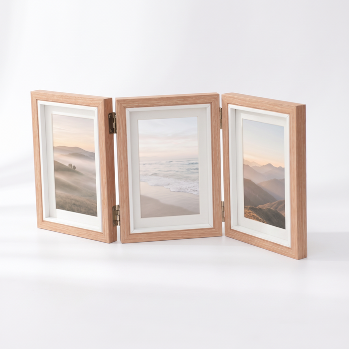 Hildesheim folding triple photo frame in natural wood on a white background