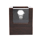 Lahr single watch winder in walnut finish with a watch behind the glass, on white