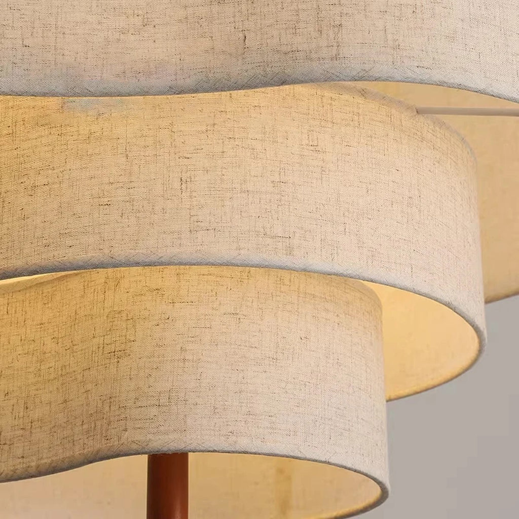 Close up of the Lauenburg linen look tiers and turned wood finial
