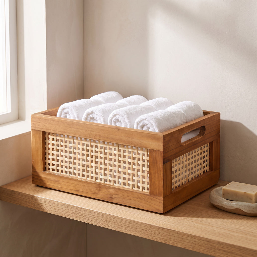 Leiden storage crate holding rolled towels on a bathroom shelf