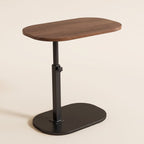 Nordlingen height adjustable C side table with walnut tone oval top on a light background