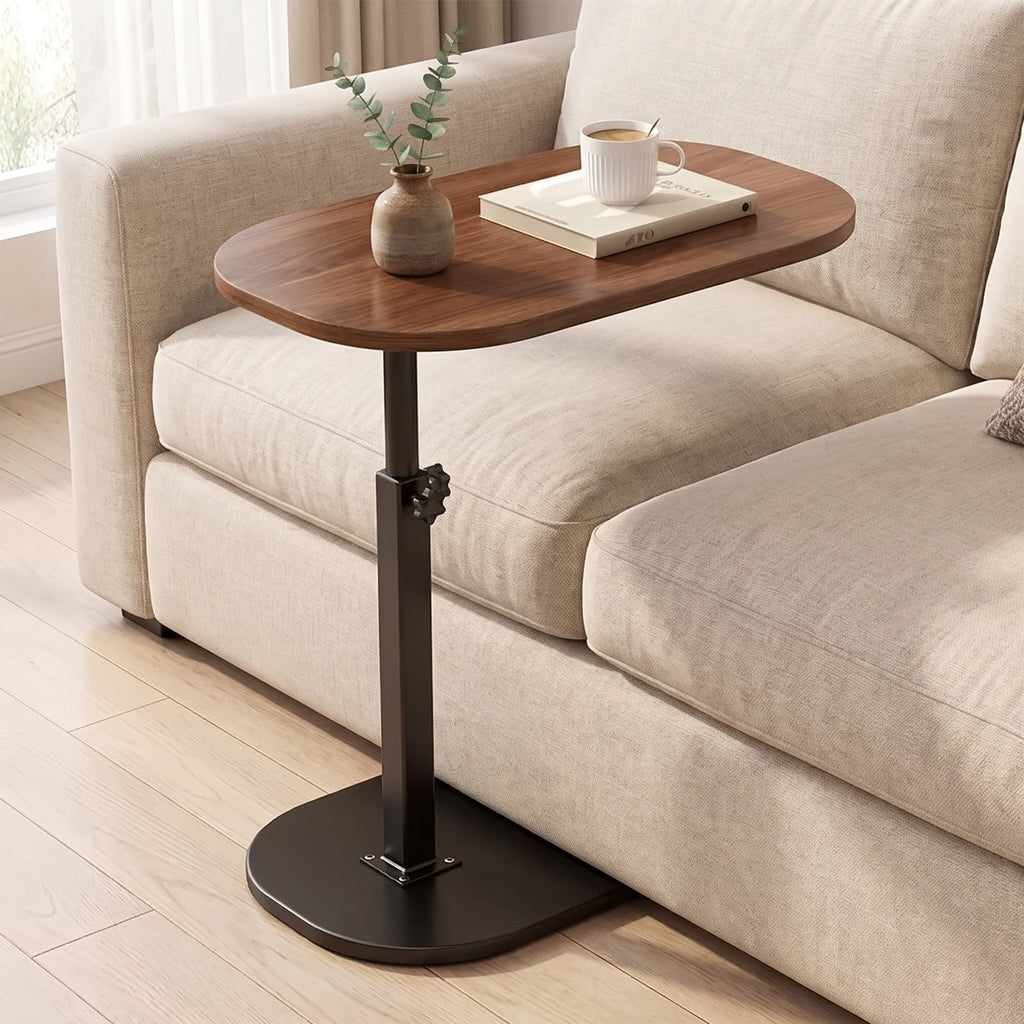 Nordlingen walnut tone side table slid under a linen sofa in a light living room