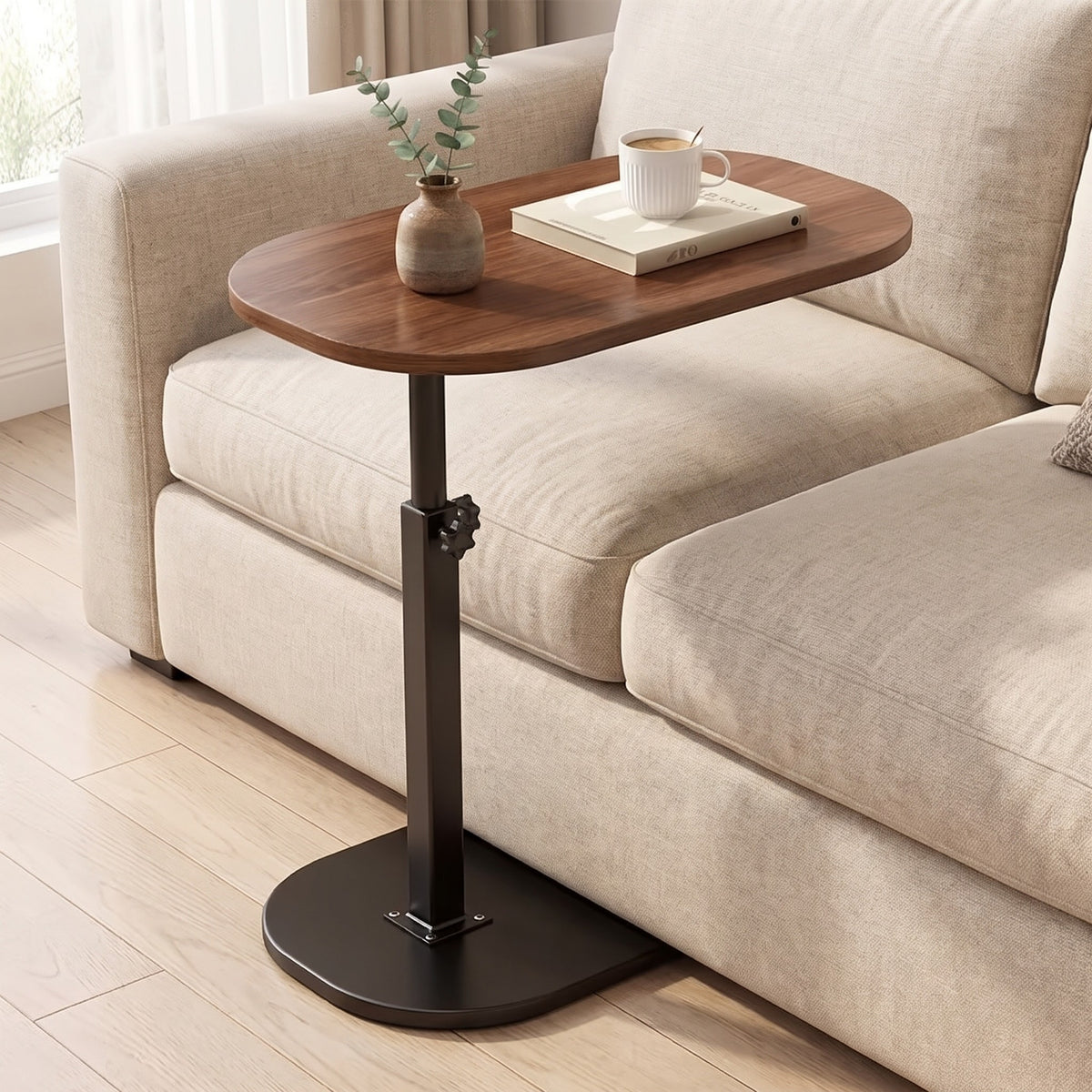 Nordlingen walnut tone side table slid under a linen sofa in a light living room