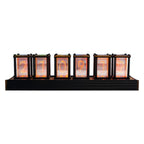Pforzheim nixie style desk clock with six glowing tubes on a white background