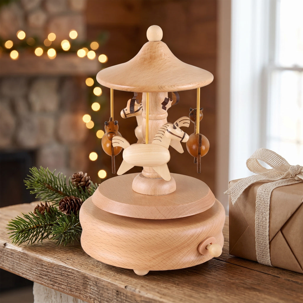 Seiffen carousel music box on a wooden mantelpiece at Christmas with a wrapped gift