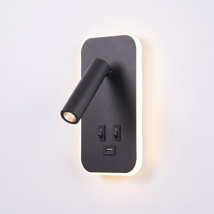 Tonning black wall reading light with the halo switched on, on white