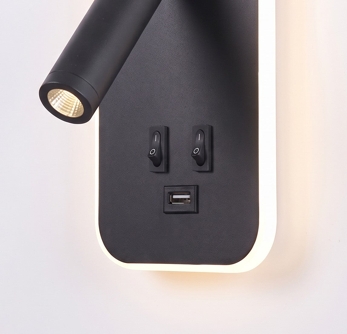 Close up of the Tonning reading spot, two switches and USB port
