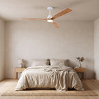 Turku Light Oak ceiling fan above a double bed